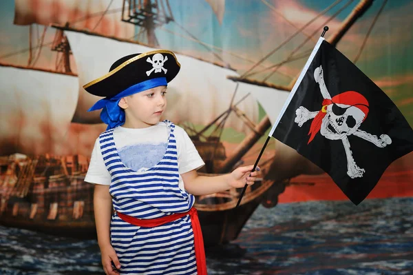 Boy pirate on ship background