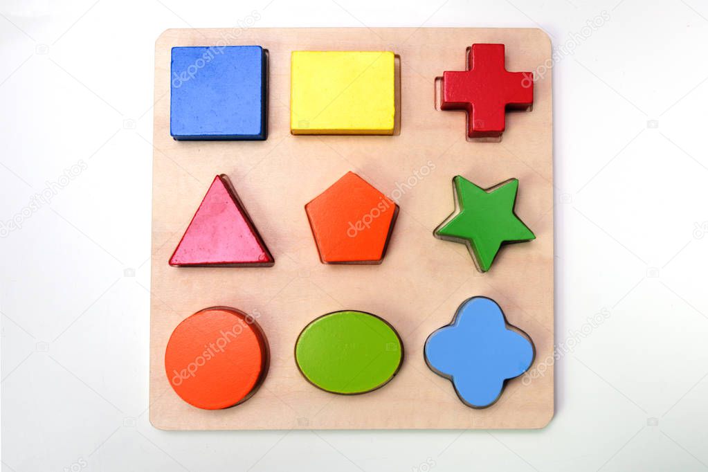 Puzzle with colored wooden figures