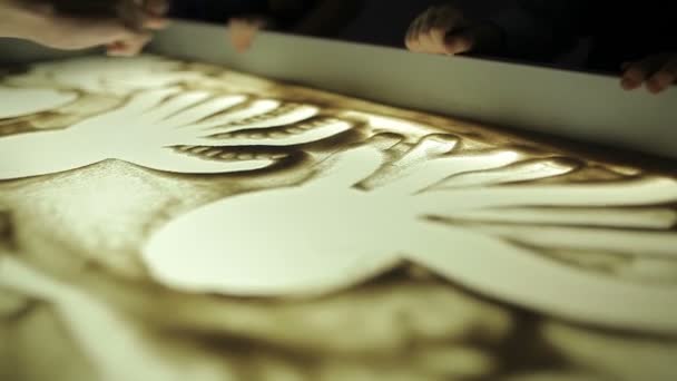 Teacher Teaches Children Draw Hands Sand Illumination — Stock Video