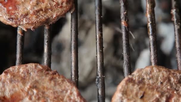 Grilled meat sausages on charcoal grill — Stock Video