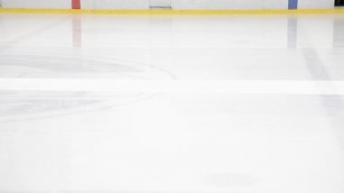 The machine cleans the ice. 