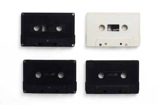 Vintage white and black cassettes tape isolated white background. — Stock Photo, Image