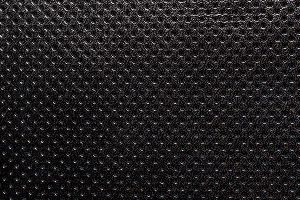 Schwarz-weißer Farbverlauf perforiertes Leder Textur Hintergrund — Stockfoto
