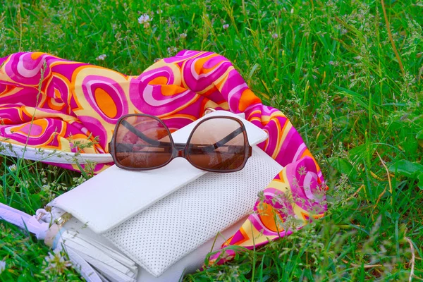 summer mood in accessories. On the grass