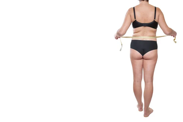 Mujer gorda en ropa interior negra usando cinta métrica —  Fotos de Stock