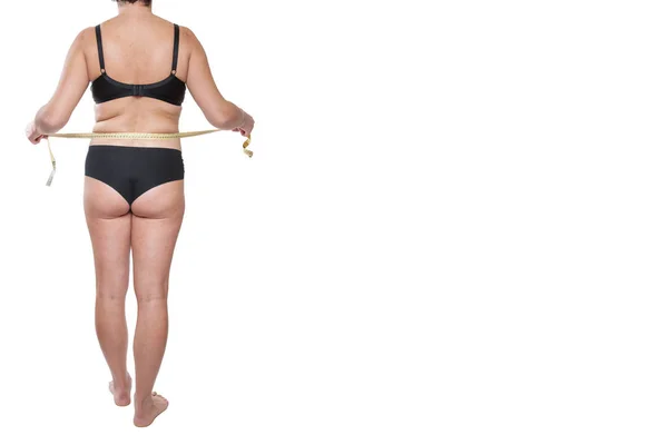 Wanita gemuk dengan pakaian dalam hitam menggunakan ukuran pita — Stok Foto