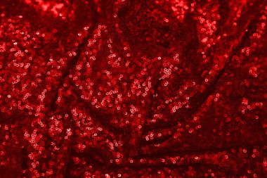 Kırmızı pullu arka plan. Tatil kartları, davetiyeler ve reklam için soyut glitter desen