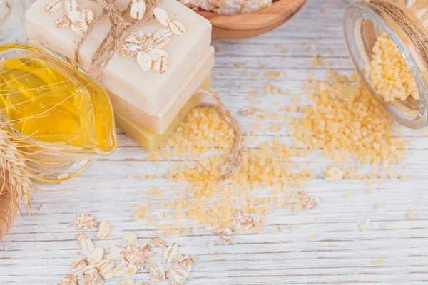 Honeycomb, sea salt, oats and handmade soap with honey — Stock Photo, Image