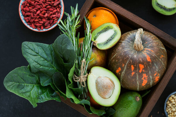 Healthy farmer organic food: fruit, vegetables, seeds, superfood