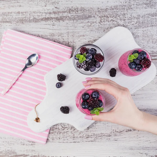 Berry smoothie, healthy detox yogurt drink, diet or vegan food c