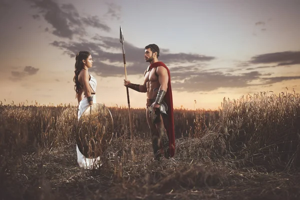 Couple meeting after war in field, looking each other. — Stock Photo, Image