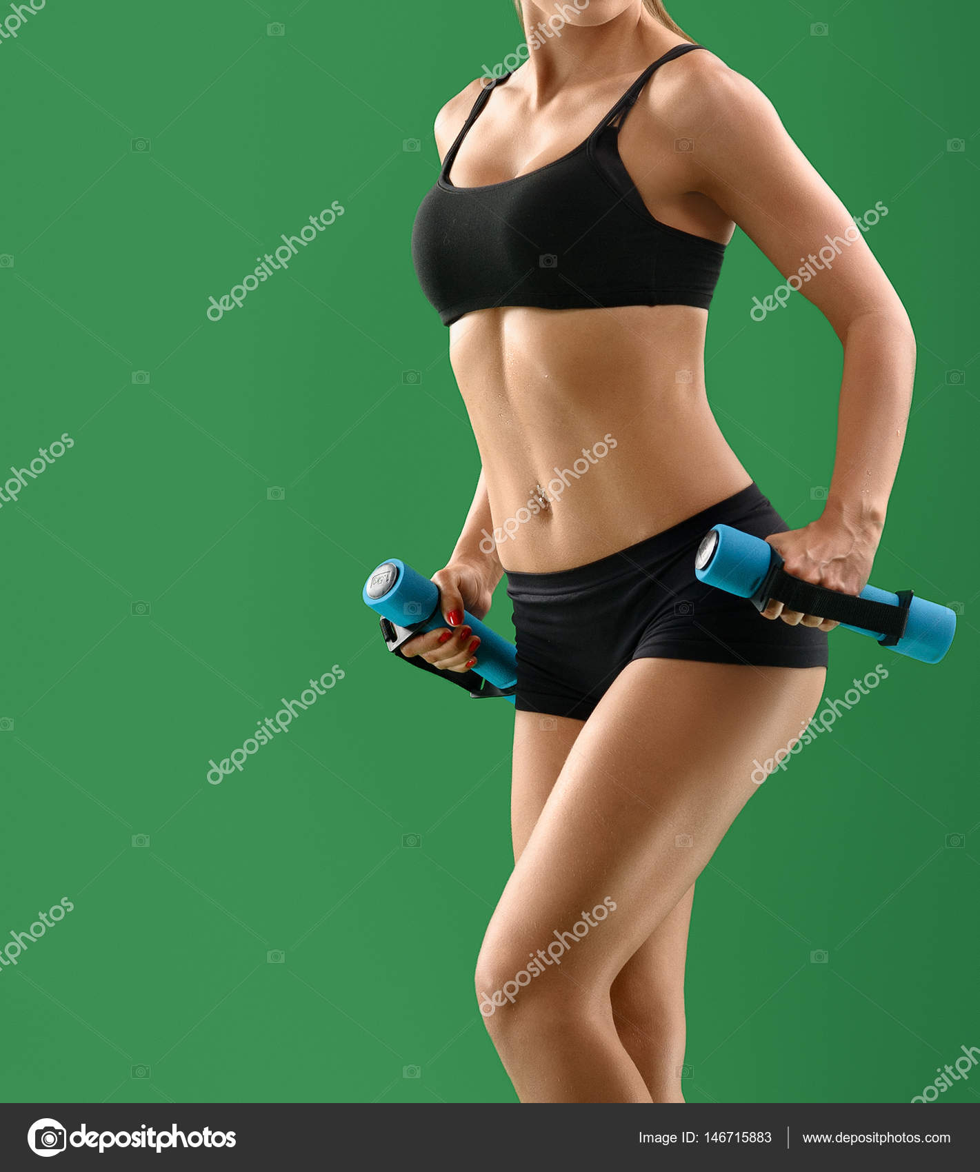 Patriotic mărimea personal Young attractive woman with dumbbells in her hands posing in stu Stock Photo by ©serhii.bobyk.gmail.com 146715883 Patriotic mărimea personal Young attractive woman with dumbbells in her hands posing in stu Stock Photo by ©serhii.bobyk.gmail.com 146715883