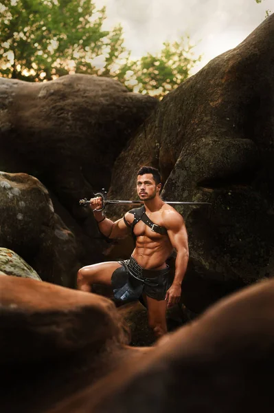 Strong warrior at the woods — Stock Photo, Image