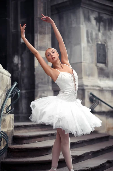 Beautiful ballet woman on stairs — Stock Photo, Image