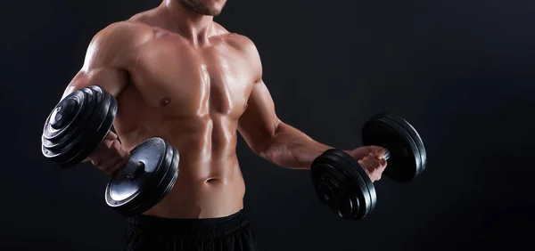 Jovem homem fitness em estúdio — Fotografia de Stock