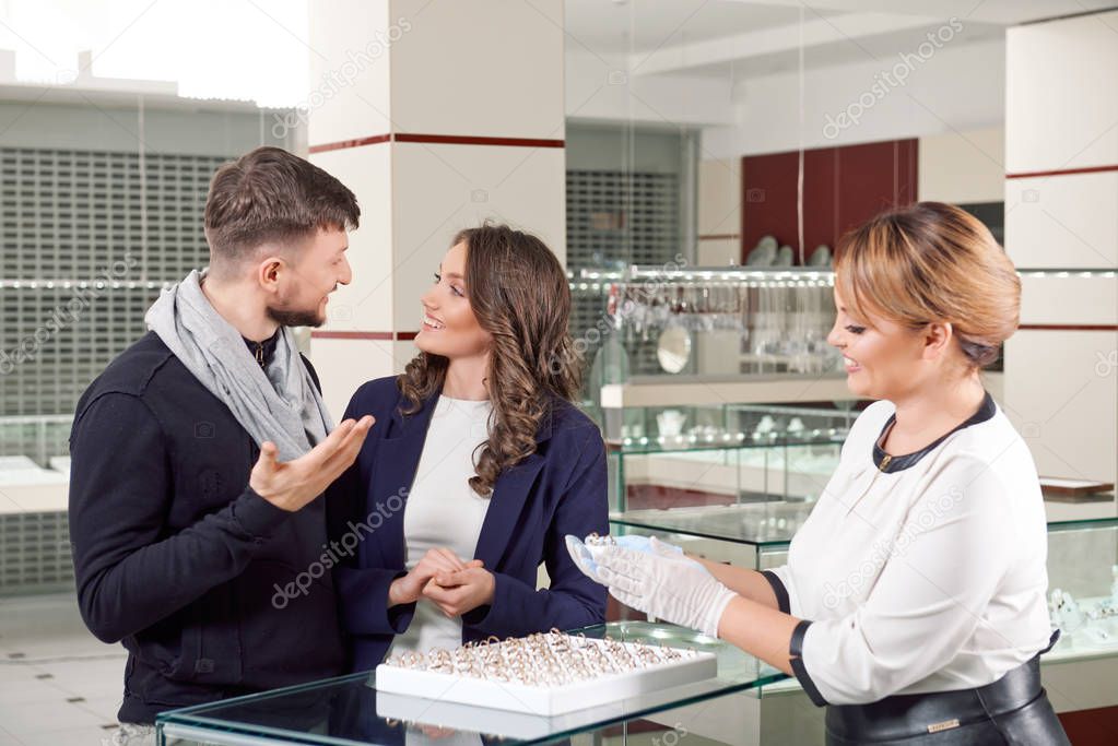 Young couple buying jewelry