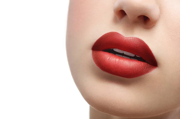 Close up shot of plump sexy female lips covered with lipstick — Stock Photo, Image