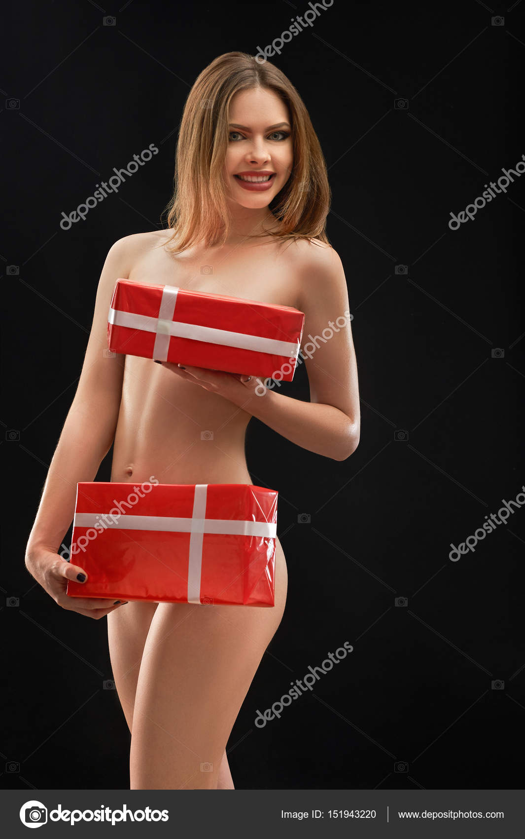 1065px x 1700px - Sexy naked girl posing with presents on black background Stock Photo by  Â©serhii.bobyk.gmail.com 151943220