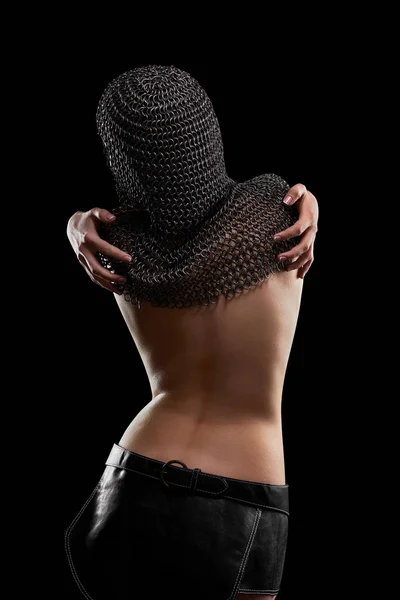Naked sexy young woman wearing chain mail — Stock Photo, Image