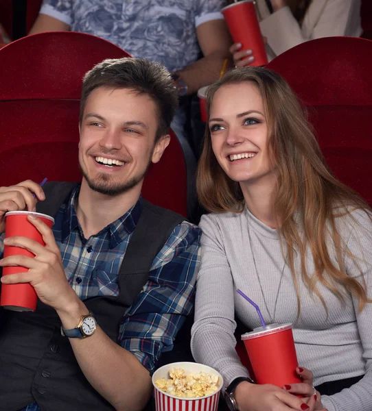 Emotionally couple watching new comedy movie at cinema. — Stock Photo, Image