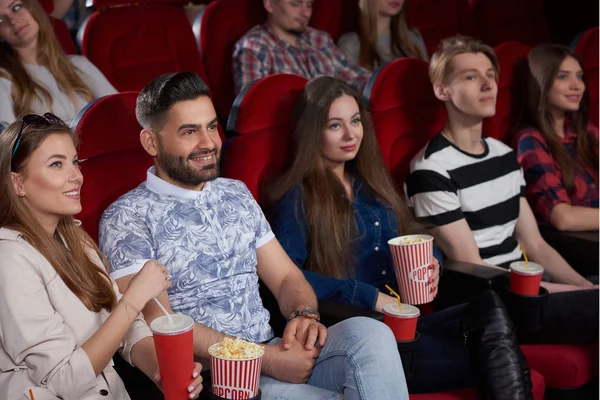 Group of best friends watching new film at modern cinema. — Stock Photo, Image