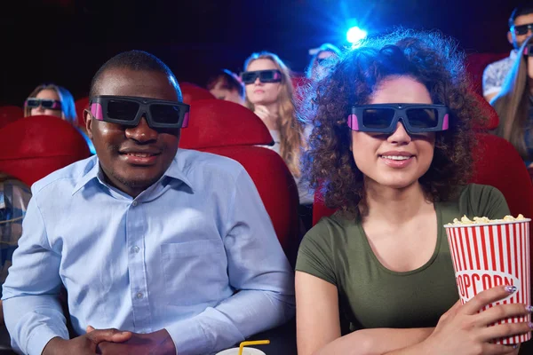 Young people watching 3D film at the movie theatre — Stock Photo, Image