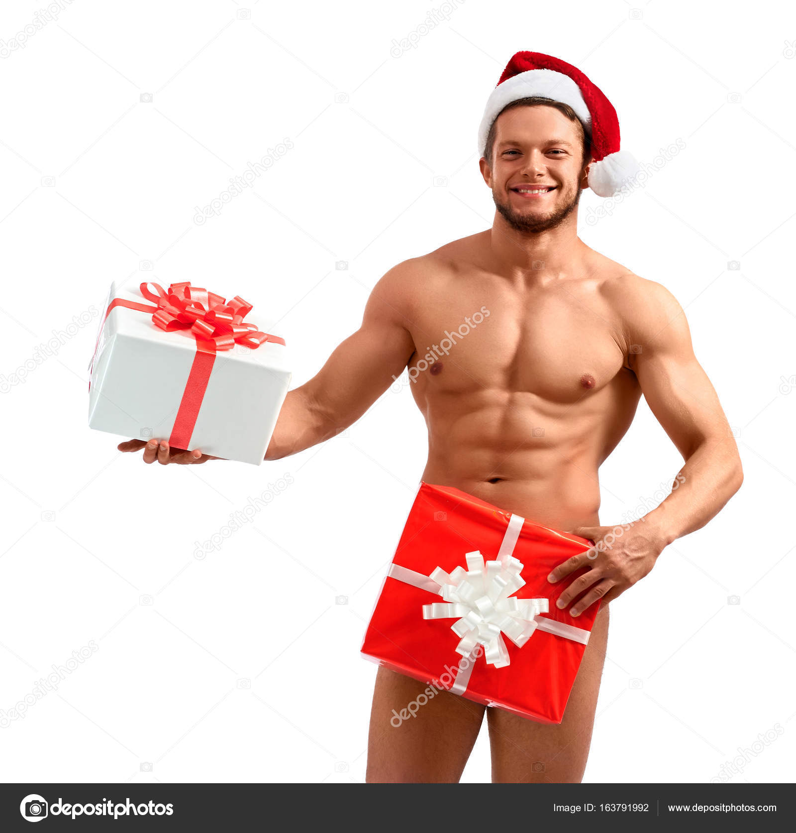 Pere Noel nu posant avec des cadeaux Photo de stock par serhii.bobyk.gmail 163791992
