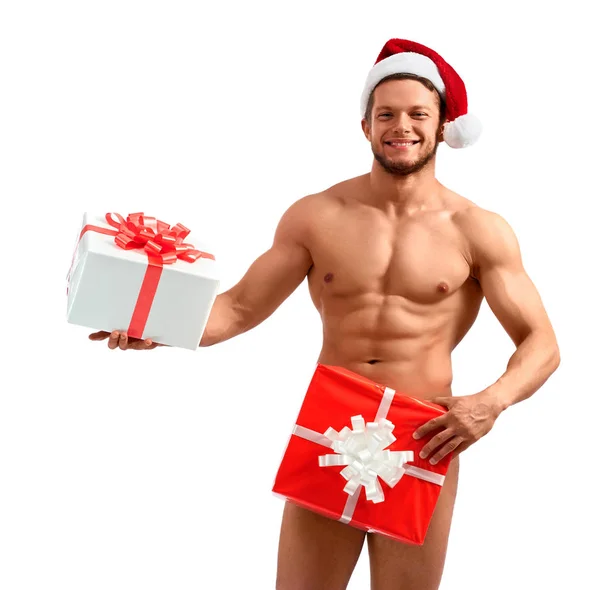 Desnudo santa posando con regalos — Foto de Stock