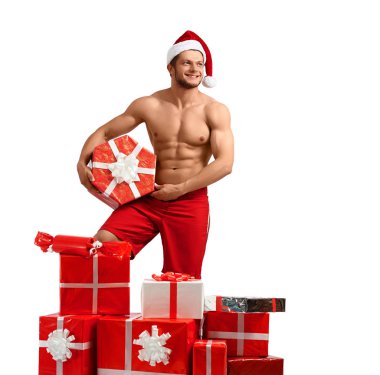 Seksi Noel Baba adam hediyeleri yığını ile