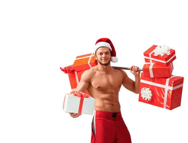 Ripped Santa Claus sosteniendo la barra y dando regalos — Foto de Stock