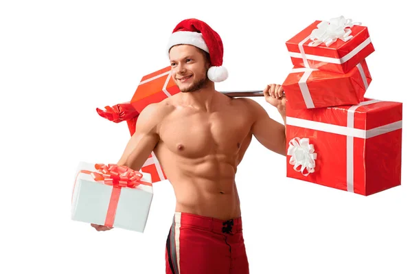 Ripped Santa Claus sosteniendo la barra y dando regalos — Foto de Stock