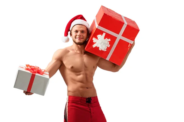 Muscular Santa Claus celebración de regalos — Foto de Stock