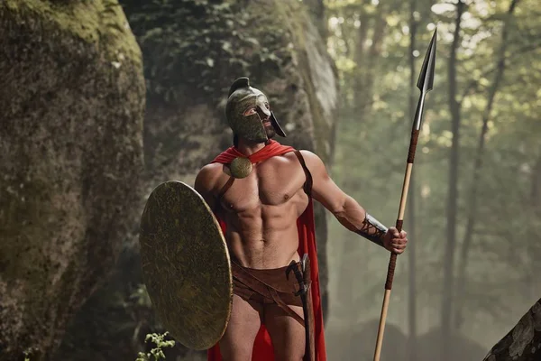Muscular Roman warrior in armor — Stock Photo, Image