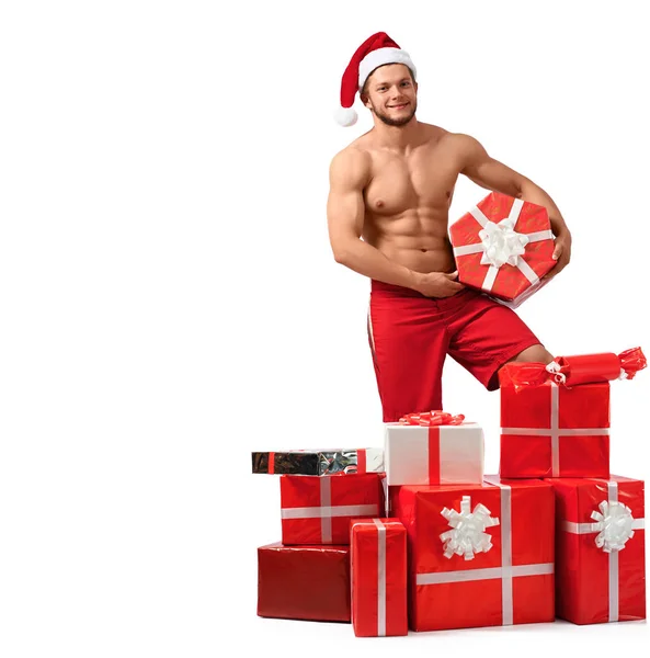 Sexy hombre de Santa Claus con un montón de regalos — Foto de Stock