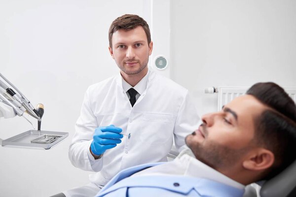 Young man visiting dentist