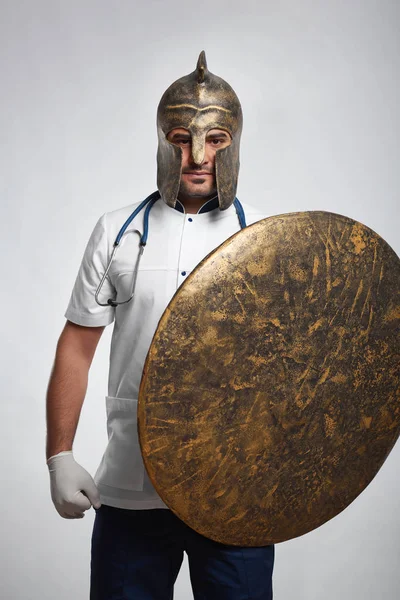 Male doctor wearing medieval armor — Stock Photo, Image