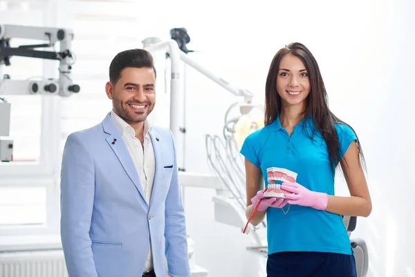 Professional female dentist at work — Stock Photo, Image