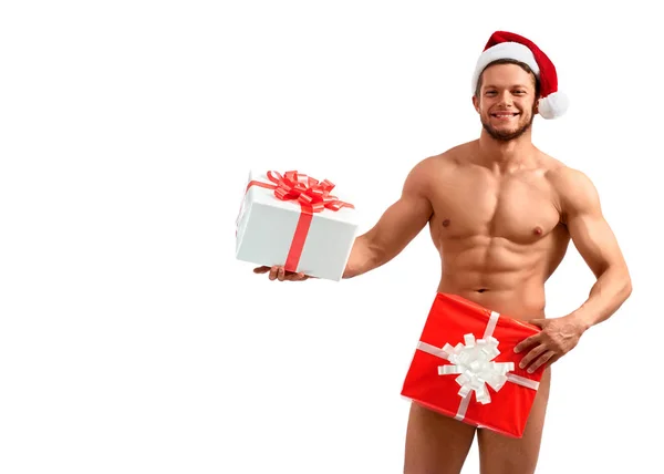 Desnudo santa posando con regalos — Foto de Stock