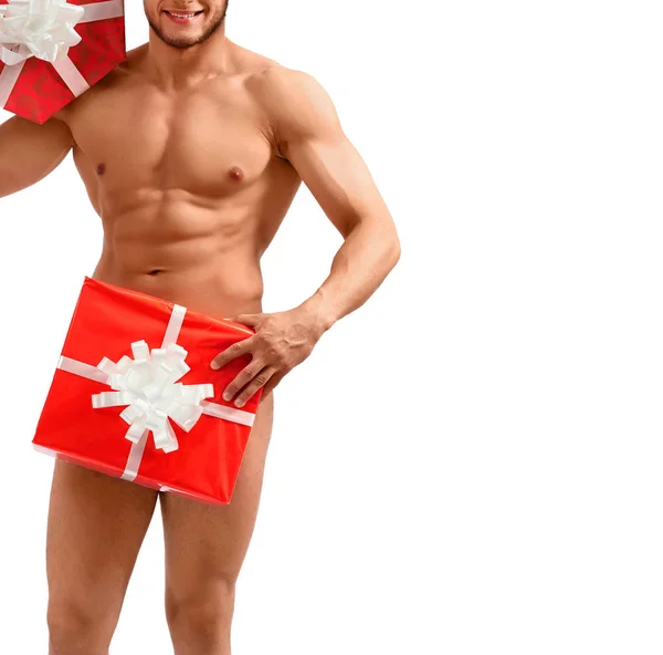 Nackter Weihnachtsmann posiert mit Geschenken — Stockfoto