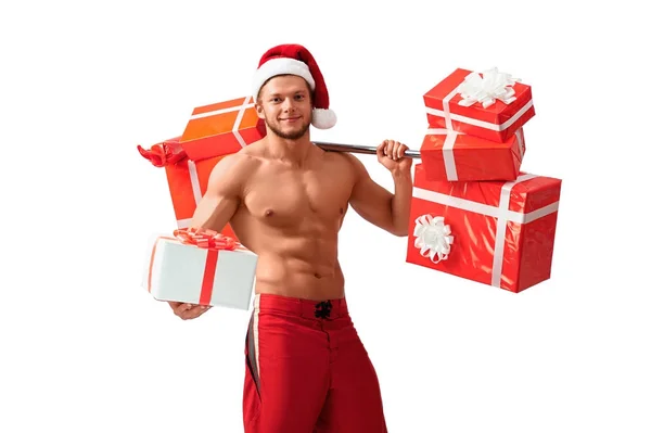 Ripped Santa Claus sosteniendo la barra y dando regalos — Foto de Stock