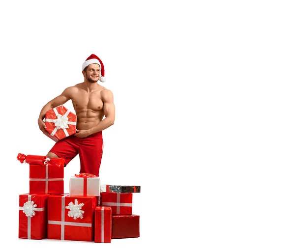 Sexy hombre de Santa Claus con un montón de regalos — Foto de Stock