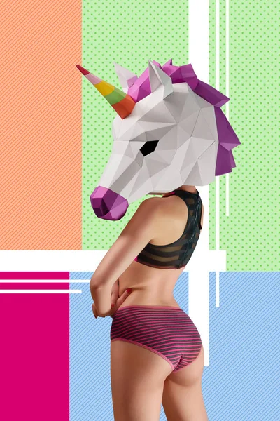 Backview of Slim model wearing colorful unicorns head. — Stock Photo, Image