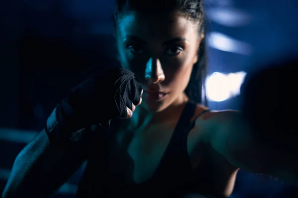 Woman fighting in sports bandages. — Stock Photo, Image