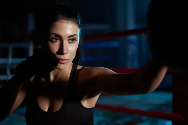 Woman fighting in sports bandages. — Stock Photo, Image