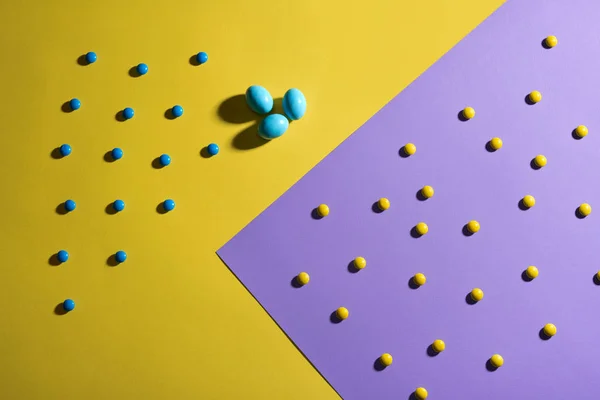 Candies in colorful sugar shell and eggs. — Stock Photo, Image