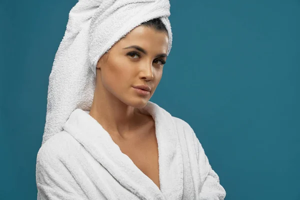 Woman in bathrobe and towel posing. — Stock Photo, Image