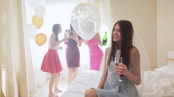 Happy attractive women drinking champagne at hen party — Stock Video