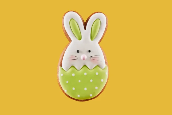 Easter bunny cookie covered with green and white glaze — Stock Photo, Image