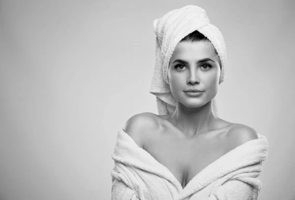 Monochrome portrait of woman in bathrobe. — Stock Photo, Image