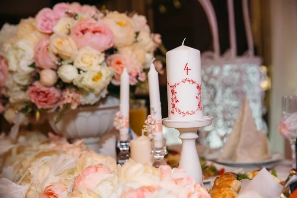 Detail of flower wedding decoration on the table